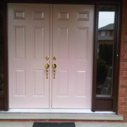 6 panel double doors with clear sidelights on the side