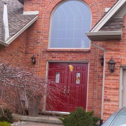 Double door with new window above with special grill patern