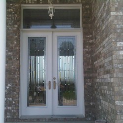 Double steel door with transom