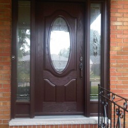 Fiberglass door with clear sidelights