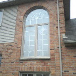 Half arch over two casements