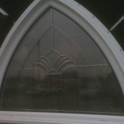 Window with decorative glass